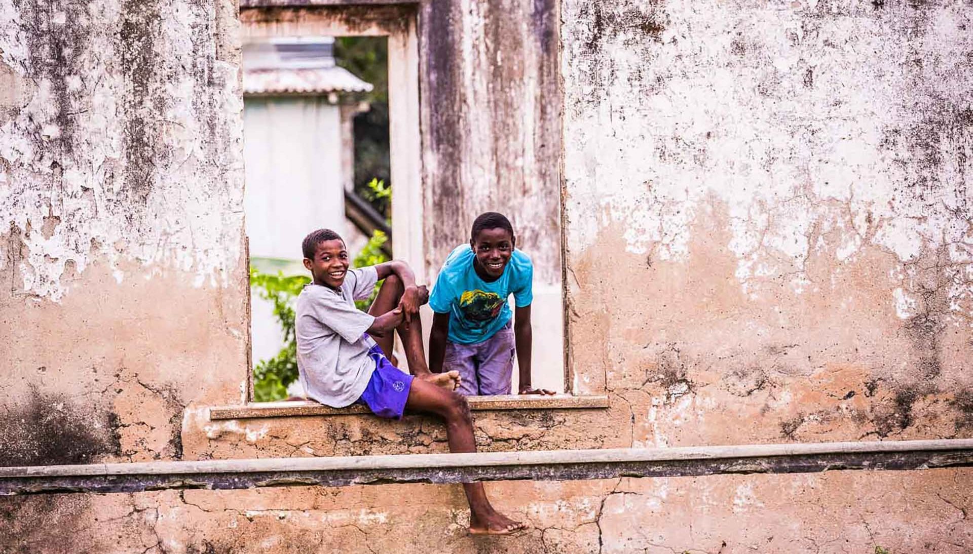Principe-Island-local-boys-relaxing-in-old-ruins-african-luxury
